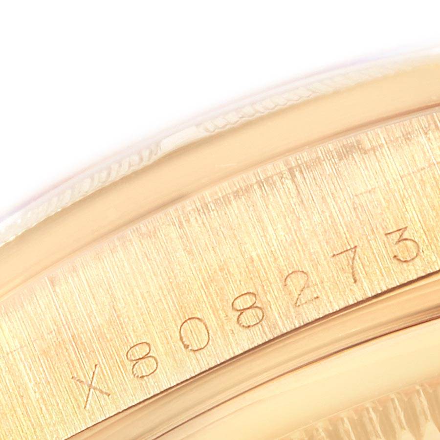 This close-up image shows the serial number engraved on the side of the Rolex President 18248 Men
s Yellow Gold Champagne Dial 18248 Men
s Yellow Gold Champagne Dial model watch case.