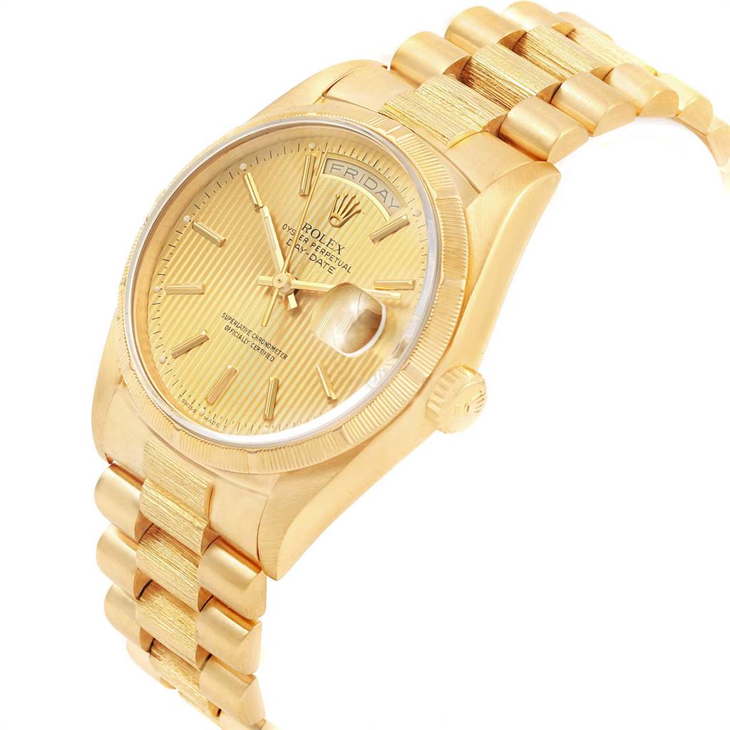 The Rolex President 18248 Men
s Yellow Gold Champagne Dial 18248 Men
s Yellow Gold Champagne Dial model is shown at a three-quarter angle, displaying its gold watch face, bezel, bracelet, and side crown.