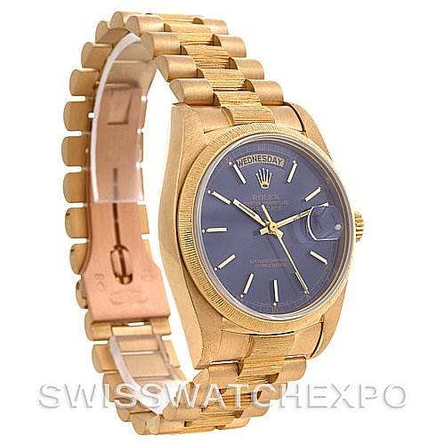 The image shows a side angle of the Rolex President 18038 Men's Yellow Gold Blue Dial 18038 Men's Yellow Gold Blue Dial model watch, highlighting the bracelet, dial, and crown.