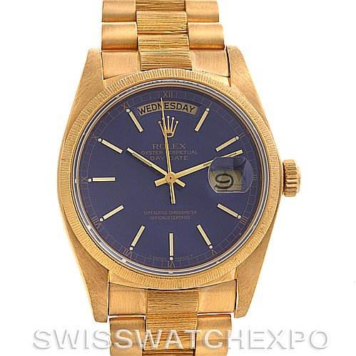 The Rolex President 18038 Men's Yellow Gold Blue Dial 18038 Men's Yellow Gold Blue Dial model watch is shown from a top view, highlighting its gold bracelet, blue dial, and day-date display.