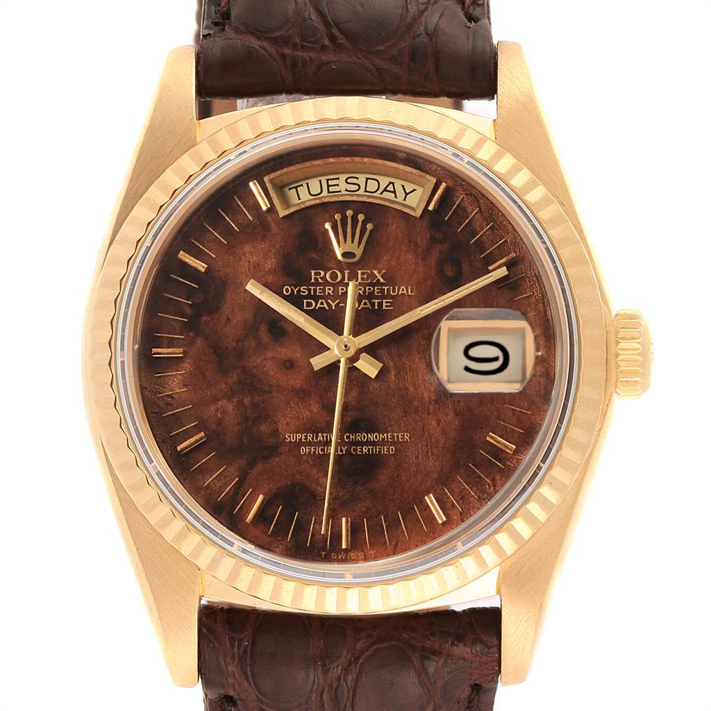 The image shows a front view of a Rolex President 18038 Men
s Yellow Gold Brown Dial 18038 Men
s Yellow Gold Brown Dial model watch, highlighting the dial, day and date display, bezel, and brown leather strap.