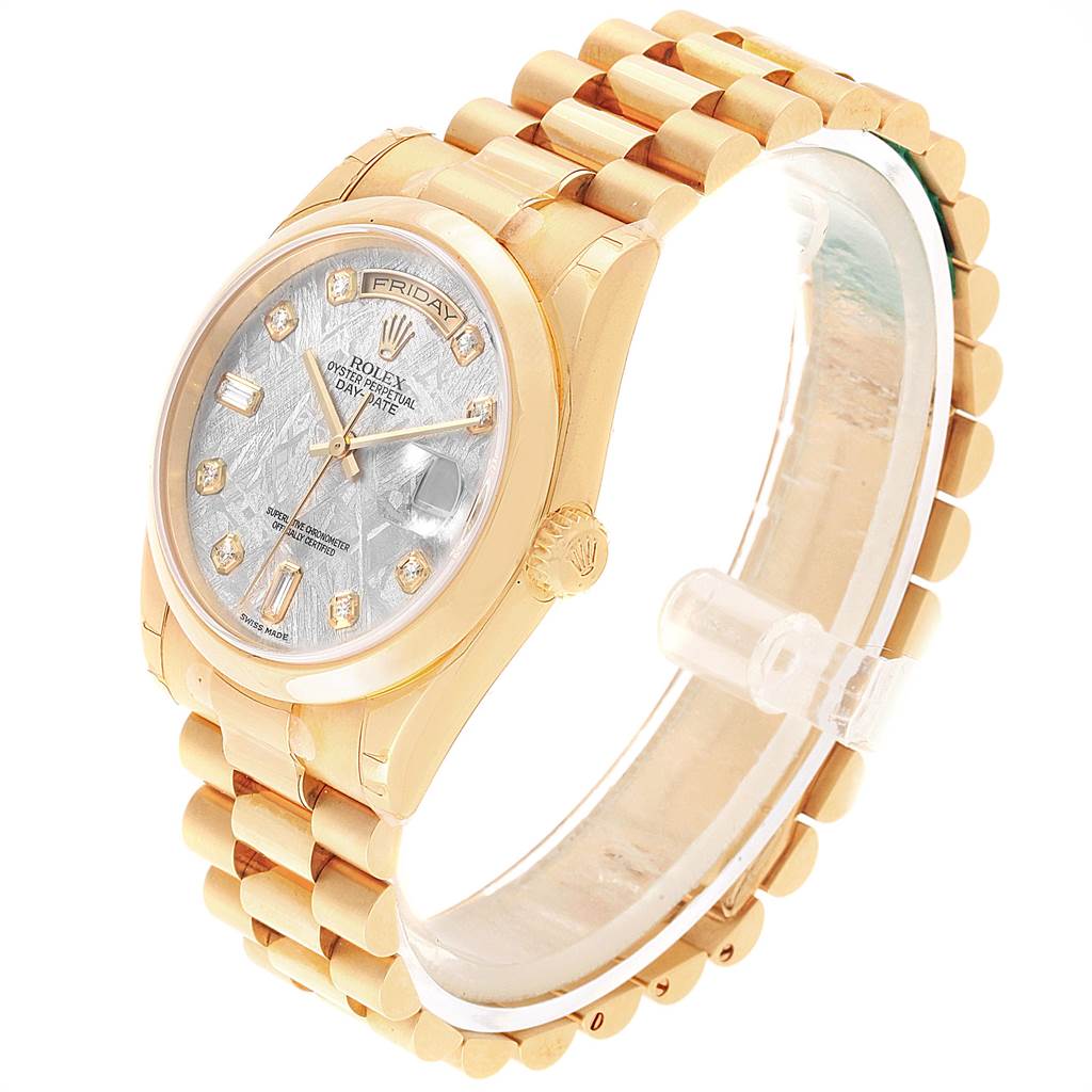 This image shows a side angle view of the Rolex President 118208 Men
s Yellow Gold Silver Dial 118208 Men
s Yellow Gold Silver Dial watch, highlighting its gold bracelet and dial.