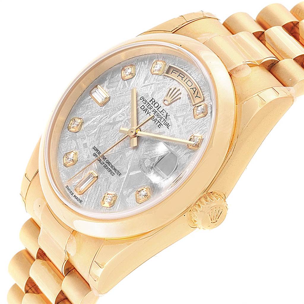 This image shows a close-up side angle of a Rolex President 118208 Men
s Yellow Gold Silver Dial 118208 Men
s Yellow Gold Silver Dial model watch, highlighting the dial, crown, and part of the bracelet.