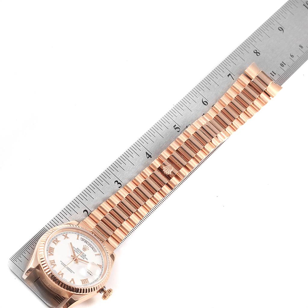 The image shows a Rolex President 118235 Men's Rose Gold White Dial 118235 Men's Rose Gold White Dial model watch laid flat next to a ruler for measurement.