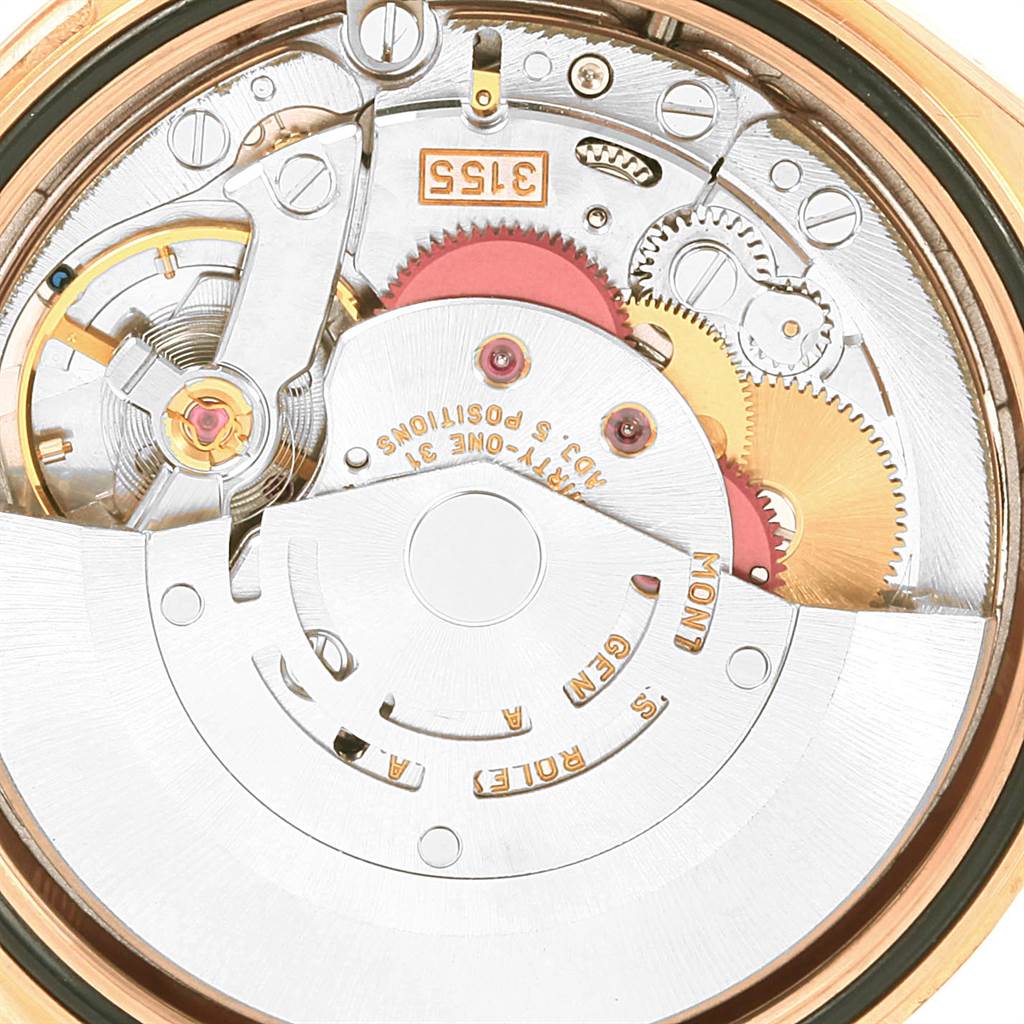 The image shows a close-up of the movement and internal mechanism of the Rolex President 118235 Men's Rose Gold White Dial 118235 Men's Rose Gold White Dial model watch.