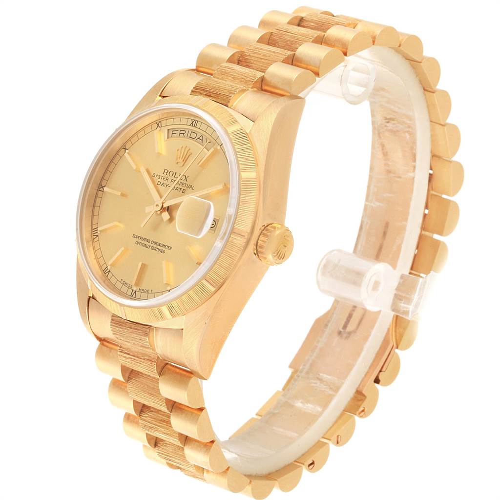 This image shows a Rolex President 18078 Men
s Yellow Gold Champagne Dial 18078 Men
s Yellow Gold Champagne Dial model watch at an angled side view, highlighting its gold bracelet, dial, and bezel.