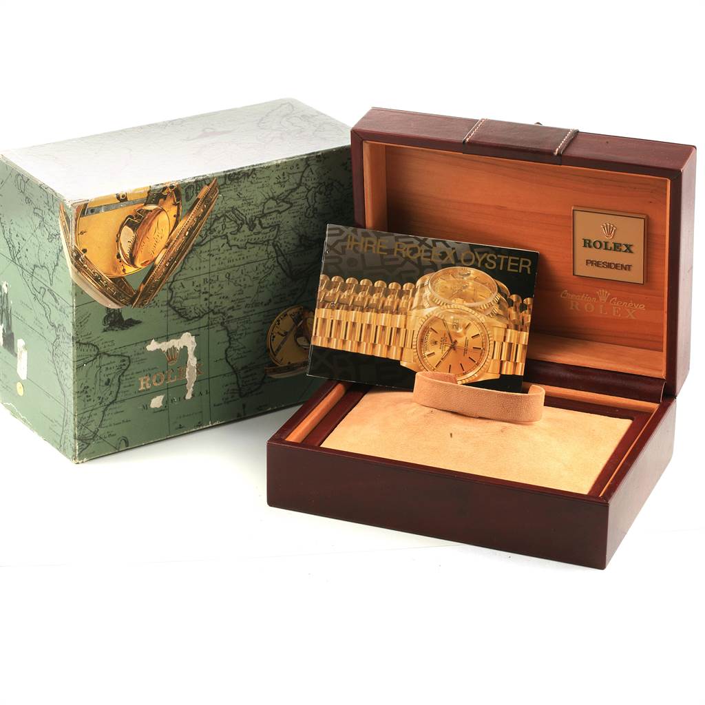 The image shows a Rolex President 18078 Men
s Yellow Gold Champagne Dial 18078 Men
s Yellow Gold Champagne Dial model watch box, with its outer box, and accompanying manuals.