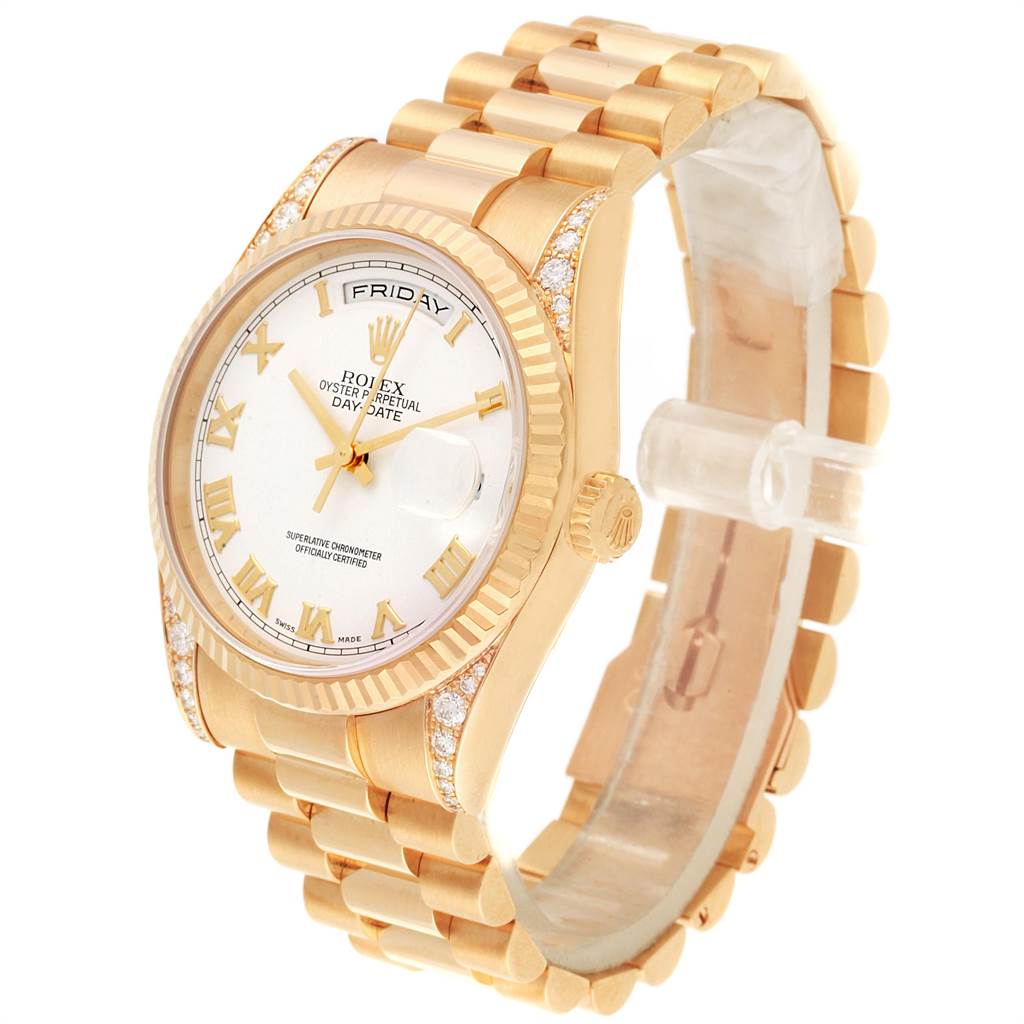 The image shows a Rolex President 118338 Men
s Yellow Gold White Dial 118338 Men
s Yellow Gold White Dial model watch, angled to display the dial, bezel, crown, and bracelet.