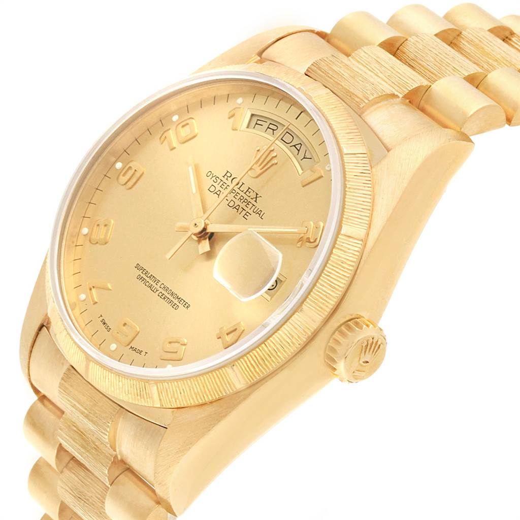 The image shows a Rolex President 18078 Men
s Yellow Gold Champagne Dial 18078 Men
s Yellow Gold Champagne Dial model watch at a slight angle, displaying its golden dial, bracelet, crown, and day-date feature.
