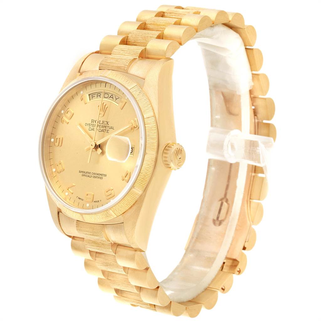 The image shows a side angle of a Rolex President 18078 Men
s Yellow Gold Champagne Dial 18078 Men
s Yellow Gold Champagne Dial model watch, highlighting its gold bracelet, case, and dial with day-date display.