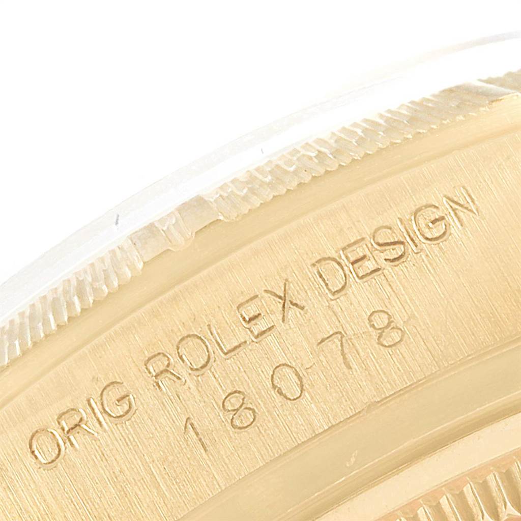 The image shows a close-up of the casing edge and model number of a Rolex President 18078 Men
s Yellow Gold Champagne Dial 18078 Men
s Yellow Gold Champagne Dial watch.