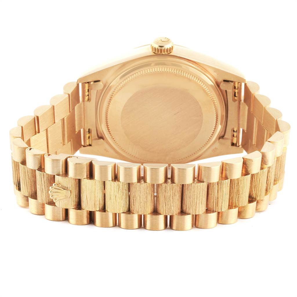 The image shows the back view of a Rolex President 18078 Men
s Yellow Gold Champagne Dial 18078 Men
s Yellow Gold Champagne Dial model watch, highlighting the bracelet and case back.