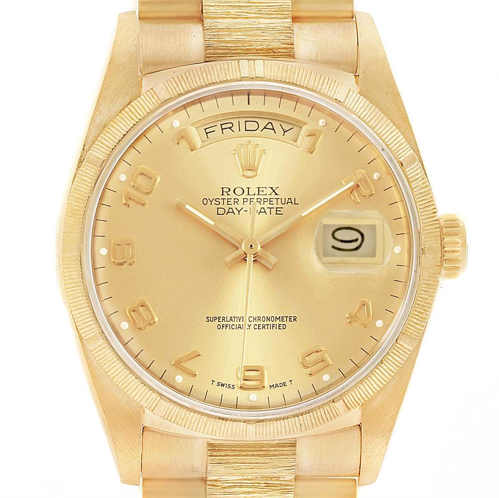 This image shows a frontal view of a Rolex President 18078 Men
s Yellow Gold Champagne Dial 18078 Men
s Yellow Gold Champagne Dial Day-Date watch, highlighting the dial, hands, date, and day display.