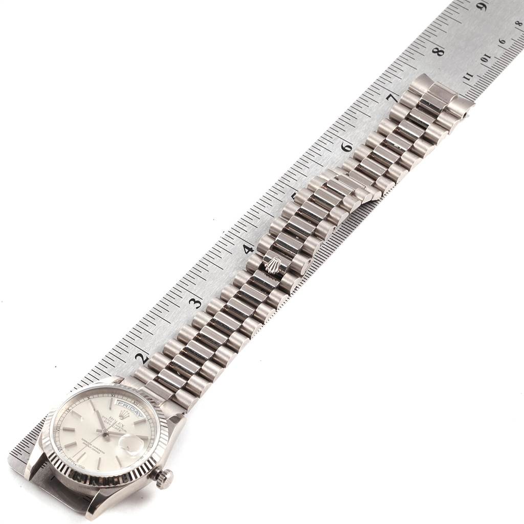 The image shows a top-down view of a Rolex President 118239 Men's White Gold Silver Dial 118239 Men's White Gold Silver Dial model watch laid next to a ruler.