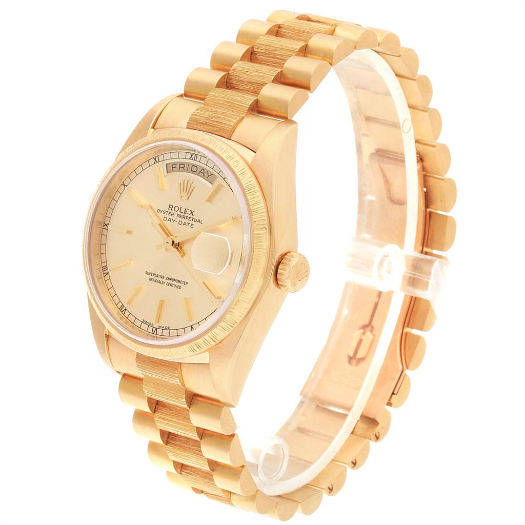 The image shows a side angle of a Rolex President 18078 Men
s Yellow Gold Champagne Dial 18078 Men
s Yellow Gold Champagne Dial model watch, highlighting its gold band, case, dial, and crown.