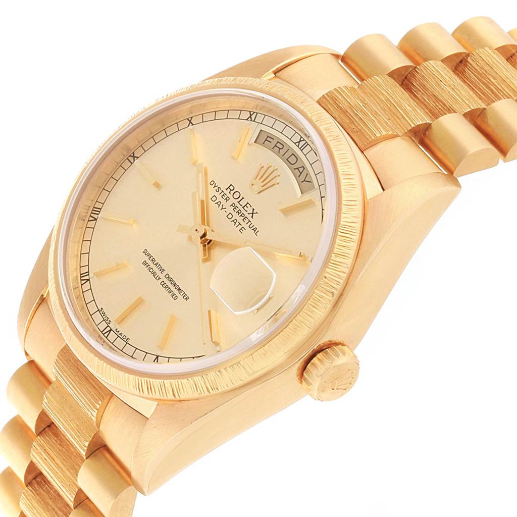 The image shows a Rolex President 18078 Men
s Yellow Gold Champagne Dial 18078 Men
s Yellow Gold Champagne Dial model watch from an oblique angle, highlighting the face, crown, and part of the bracelet.