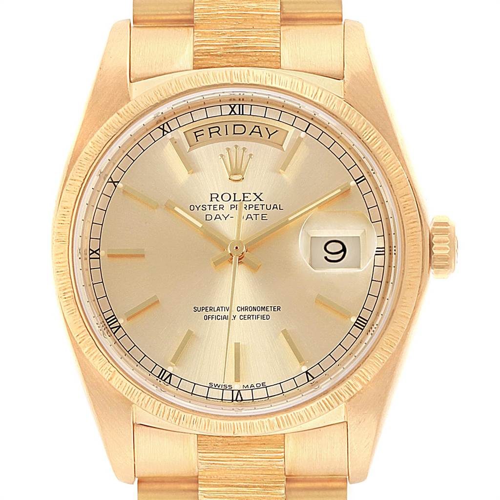 The image shows the dial and buckle of the Rolex President 18078 Men
s Yellow Gold Champagne Dial 18078 Men
s Yellow Gold Champagne Dial watch, highlighting the day, date, and gold detailing.