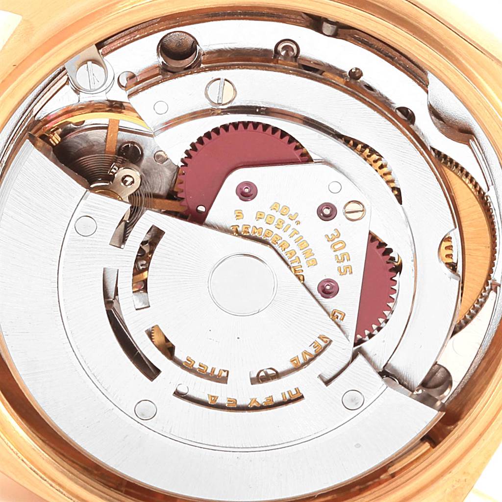 This image shows the internal mechanism of a Rolex President 18078 Men
s Yellow Gold Champagne Dial 18078 Men
s Yellow Gold Champagne Dial model watch from the back angle, highlighting its intricate gears and components.