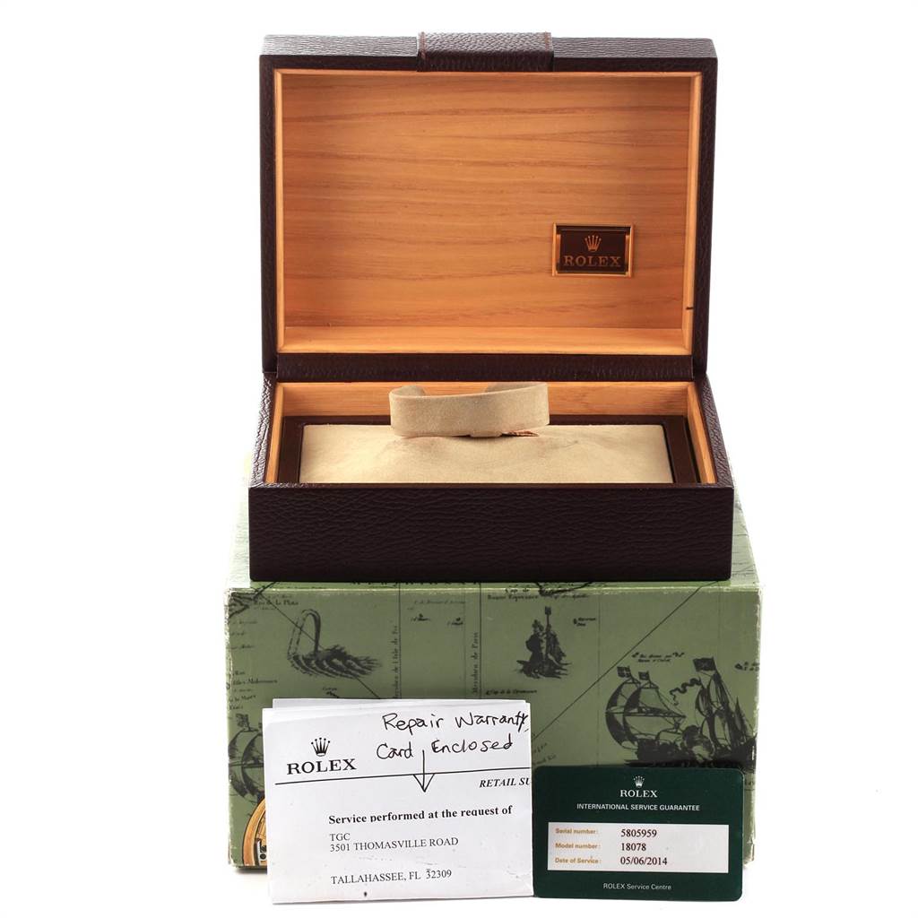 The image shows an open Rolex President 18078 Men
s Yellow Gold Champagne Dial 18078 Men
s Yellow Gold Champagne Dial model watch box with warranty cards and documents.