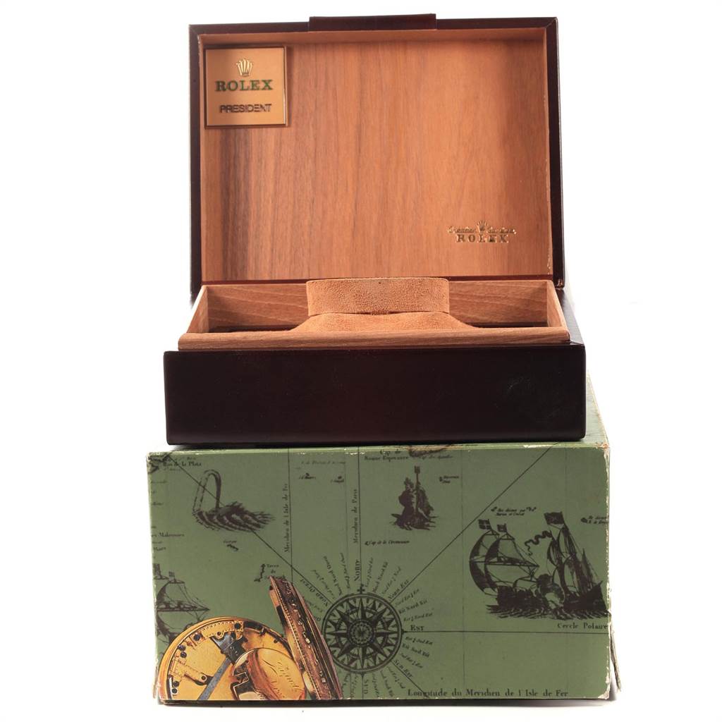The image shows an open wooden box for a Rolex President 18238 Men
s Yellow Gold Champagne Dial 18238 Men
s Yellow Gold Champagne Dial model watch, placed on a green map-themed outer box.