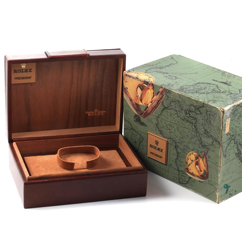 The image shows an open wooden box for a Rolex President 18038 Men's Yellow Gold Champagne Dial 18038 Men's Yellow Gold Champagne Dial model watch, alongside its green decorative outer box.
