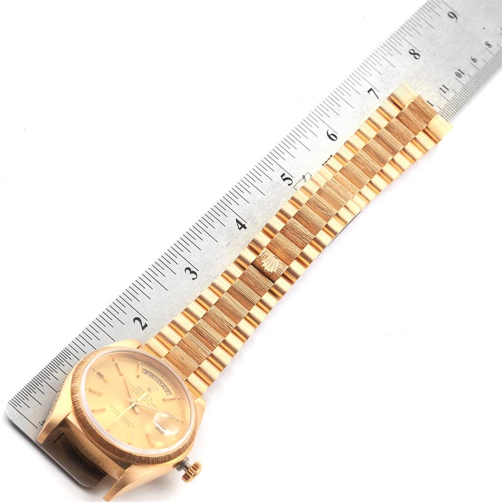The image shows a Rolex President 18078 Men's Yellow Gold Champagne Dial 18078 Men's Yellow Gold Champagne Dial model watch with focus on the face, case, and bracelet against a ruler for measurement.