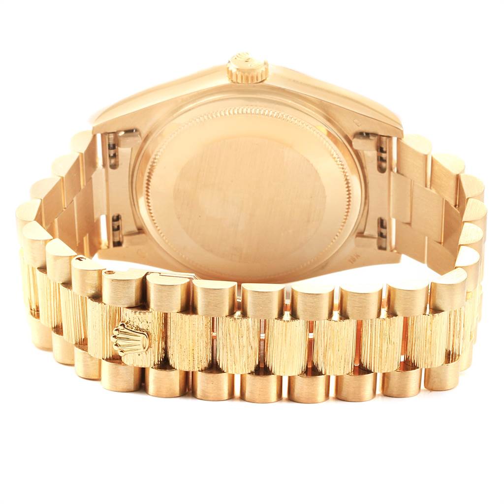 The image shows the back view of a Rolex President 18078 Men's Yellow Gold Champagne Dial 18078 Men's Yellow Gold Champagne Dial model watch, highlighting its gold case and bracelet.