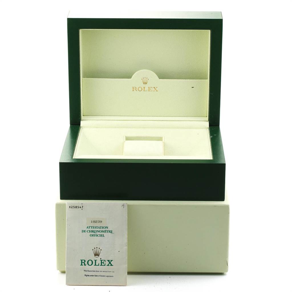 The image shows an open green and cream box for the Rolex President 18239 Men's White Gold Silver Dial 18239 Men's White Gold Silver Dial model with its certificate booklet.