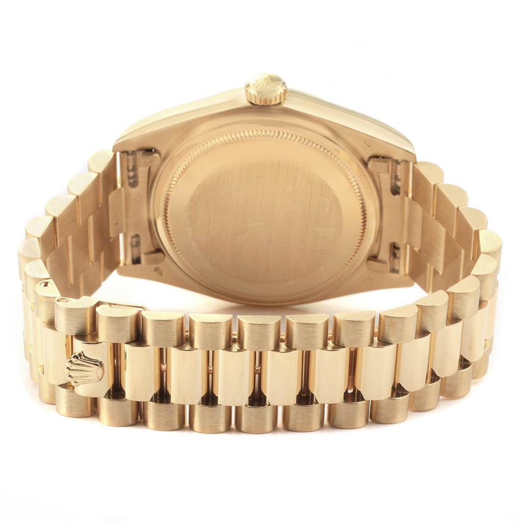 The image shows the back view of the Rolex President 18038 Men's Yellow Gold Champagne Dial 18038 Men's Yellow Gold Champagne Dial model watch, highlighting the closed case back and bracelet links.