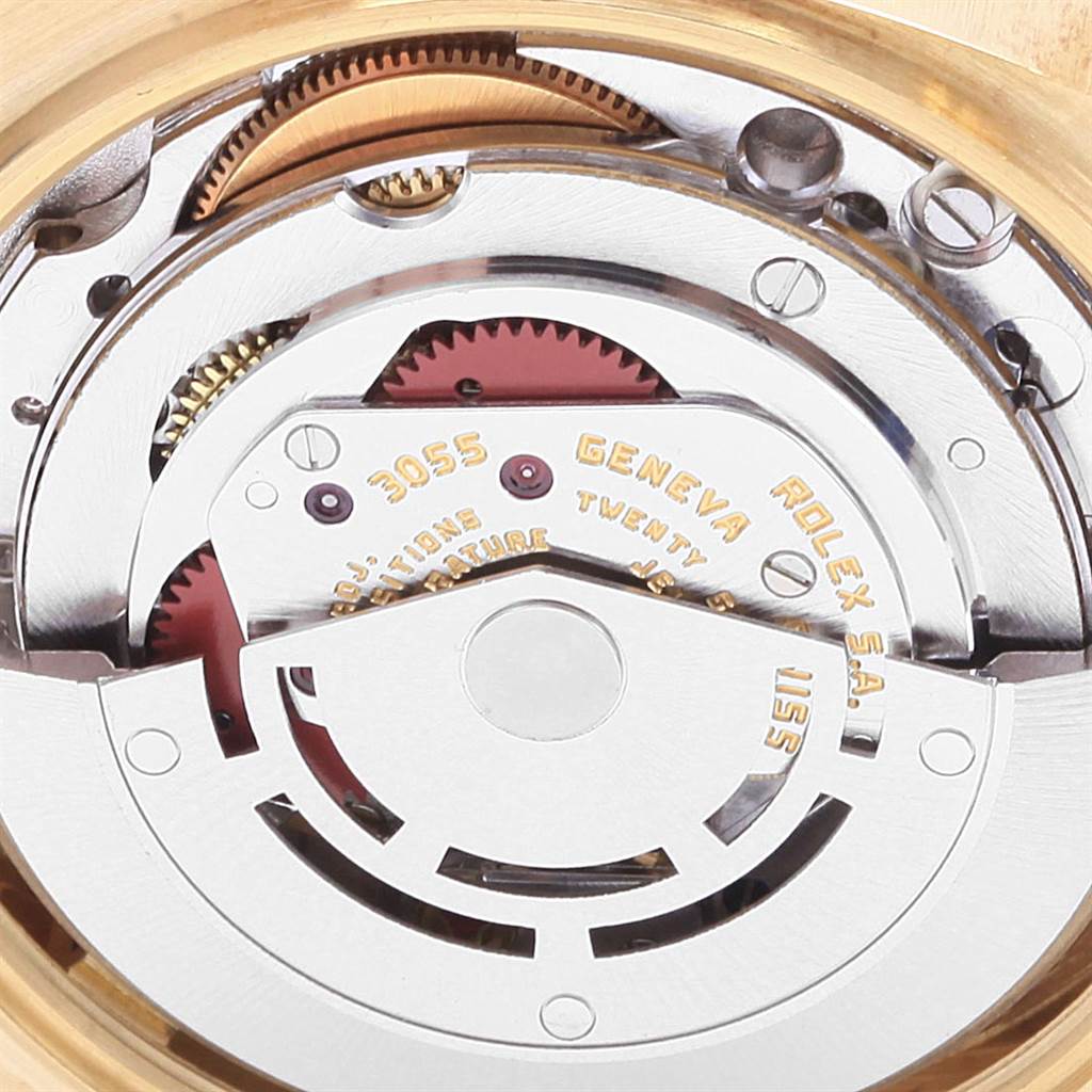 This image shows an up-close view of the internal mechanism of a Rolex President 18038 Men's Yellow Gold Champagne Dial 18038 Men's Yellow Gold Champagne Dial model watch, highlighting its movement components.