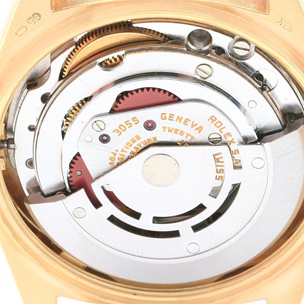 This image shows the internal movement mechanism of the Rolex President 18038 Men's Yellow Gold Blue Dial 18038 Men's Yellow Gold Blue Dial model watch, highlighting its intricate components and gears.