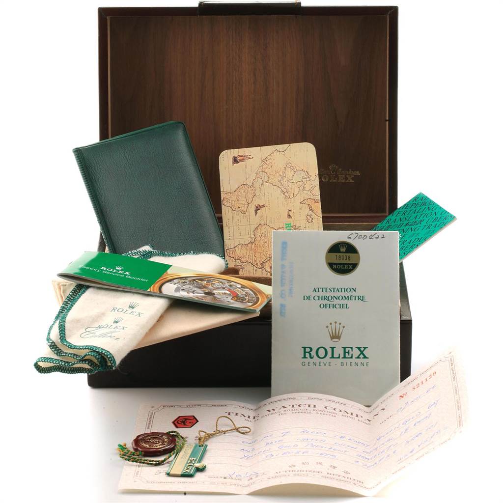 The image shows a Rolex President 18038 Men
s Stainless Steel White Dial 18038 Men
s Stainless Steel White Dial model watch packaging with accessories, including manuals, certificates, a map, and a cleaning cloth.