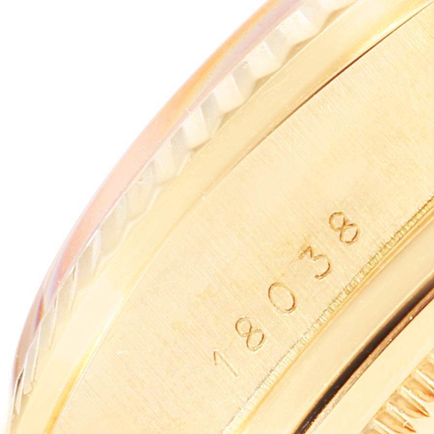 This close-up image shows part of the case and bezel of a Rolex President 18038 Men
s Stainless Steel White Dial 18038 Men
s Stainless Steel White Dial model watch, highlighting the serial number 18038.