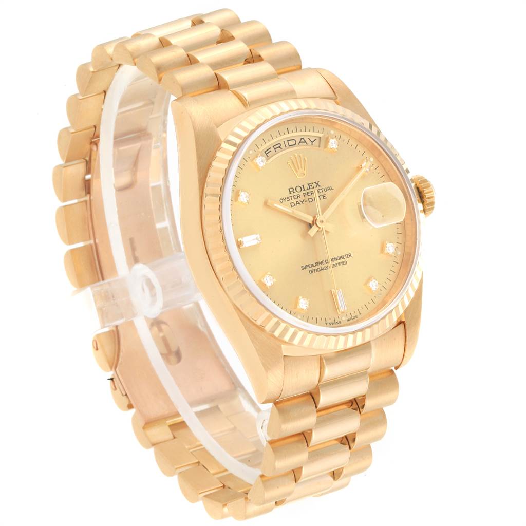 This is a side view of a gold Rolex President 18238 Men
s Yellow Gold Champagne Dial 18238 Men
s Yellow Gold Champagne Dial model watch, showing the dial, bracelet, and crown.