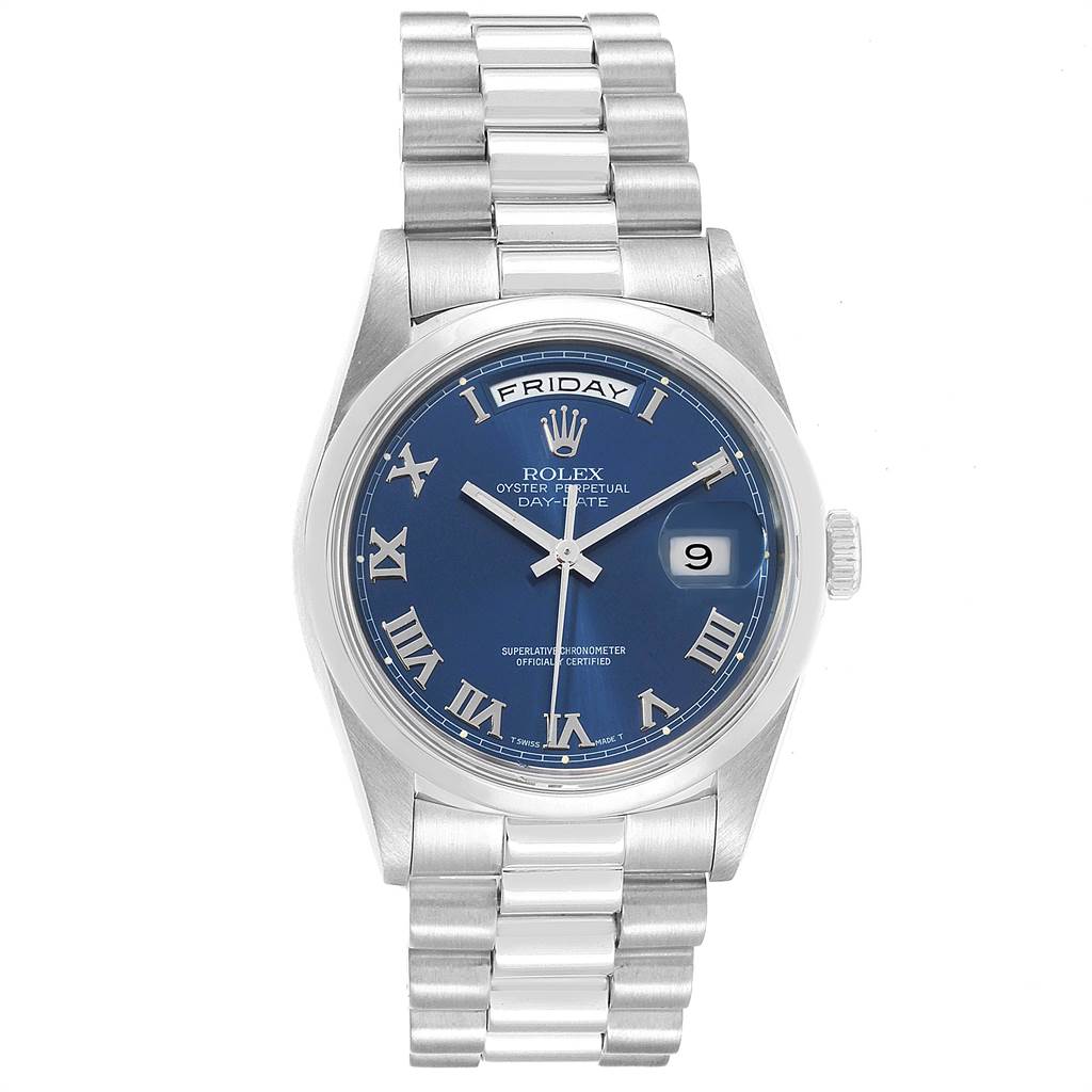 The image shows a front view of the Rolex President 18206 Men's Platinum Blue Dial 18206 Men's Platinum Blue Dial model watch, highlighting the blue dial, day-date feature, and silver bracelet.