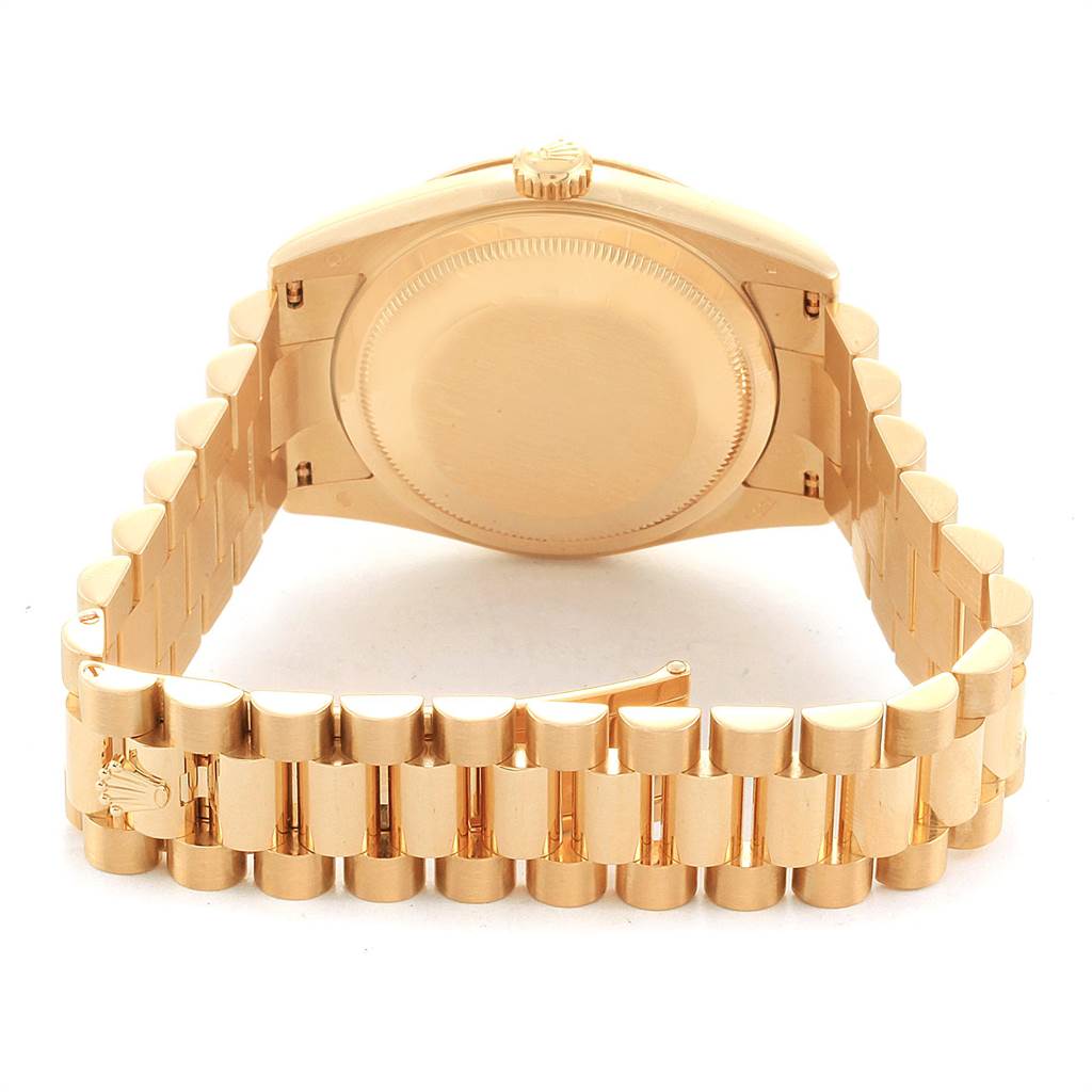 The image shows the back case and bracelet of the Rolex President 118238 Men
s Yellow Gold Silver Dial 118238 Men
s Yellow Gold Silver Dial model watch, viewed from a rear angle.