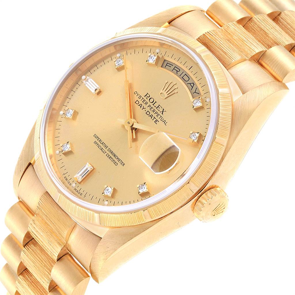 The image shows a close-up of the Rolex President 18248 Men
s Yellow Gold Champagne Dial 18248 Men
s Yellow Gold Champagne Dial Day-Date watch, highlighting its dial, crown, bezel, and bracelet. 