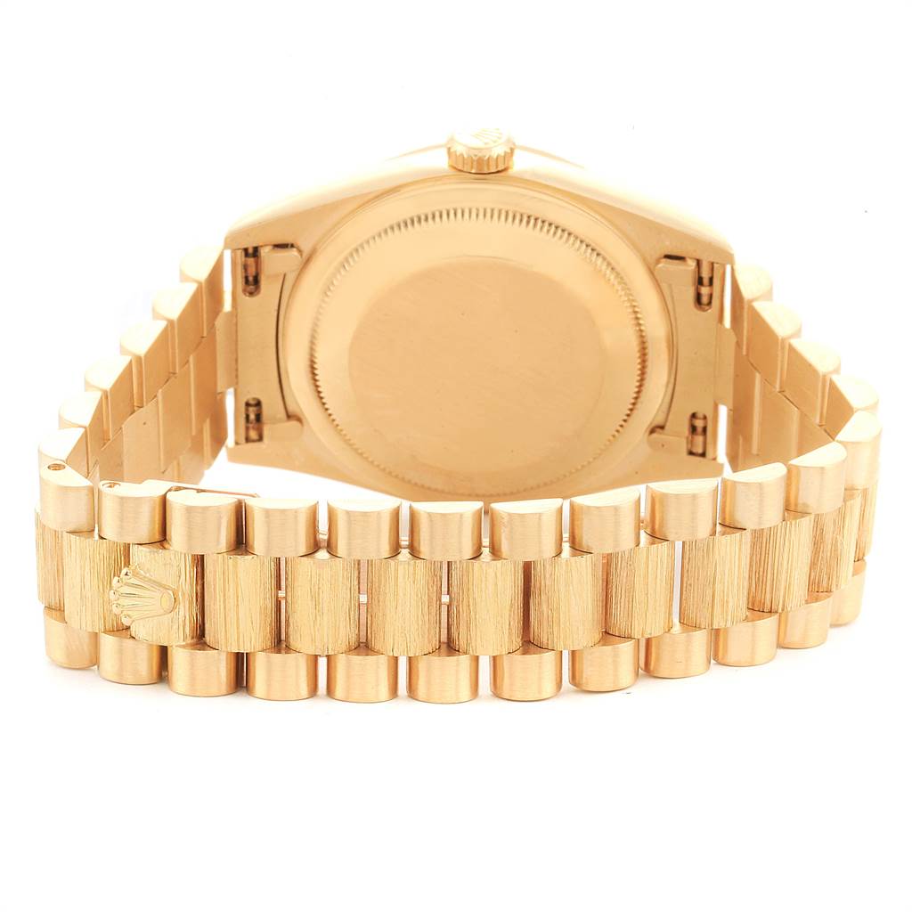The image shows the back view of a Rolex President 18248 Men
s Yellow Gold Champagne Dial 18248 Men
s Yellow Gold Champagne Dial model watch, highlighting the case back and the President bracelet.