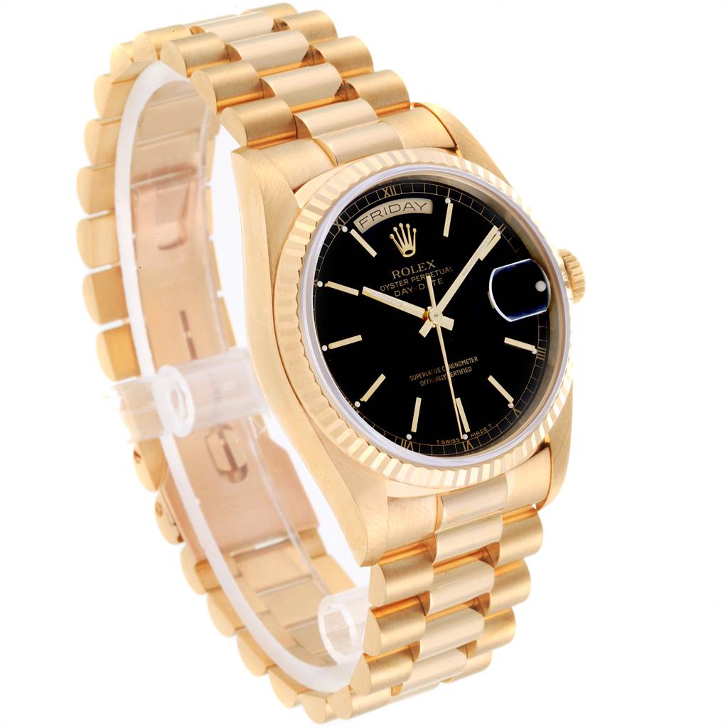 The image shows a Rolex President 18238 Men
s Yellow Gold Black Dial 18238 Men
s Yellow Gold Black Dial model watch from an angled view, highlighting its gold band, black dial, and day-date feature.