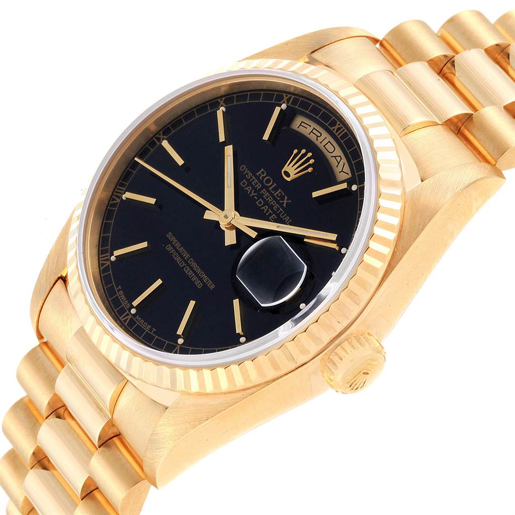 This image shows a side angle of the Rolex President 18238 Men
s Yellow Gold Black Dial 18238 Men
s Yellow Gold Black Dial model watch, highlighting its gold case, black dial, and bracelet.