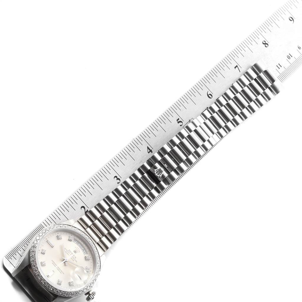 The image shows the face and band of a Rolex President 18346 Men's Platinum Silver Dial 18346 Men's Platinum Silver Dial model watch, measured alongside a ruler.