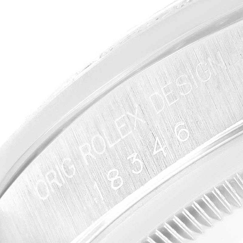 This image shows a close-up of the engraved model number and design details on the bezel of a Rolex President 18346 Men's Platinum Silver Dial 18346 Men's Platinum Silver Dial watch.