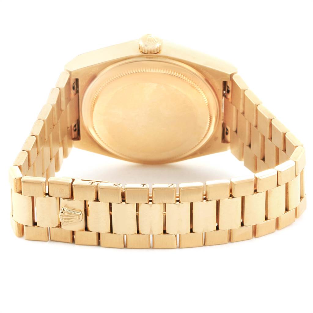 This image shows the back and bracelet of a Rolex President 19018 Men
s Yellow Gold Black Dial 19018 Men
s Yellow Gold Black Dial model watch from a rear angle.