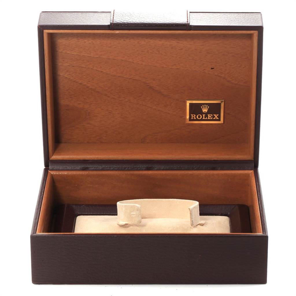 The Rolex President 18038 Men
s Yellow Gold White Dial 18038 Men
s Yellow Gold White Dial model watch box is shown open, displaying its wood and leather interior with a cushion holder inside.