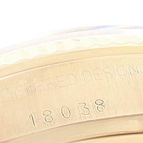This close-up image shows the model number "18038" engraved on the side of a Rolex President 18038 Men
s Yellow Gold White Dial 18038 Men
s Yellow Gold White Dial watch.