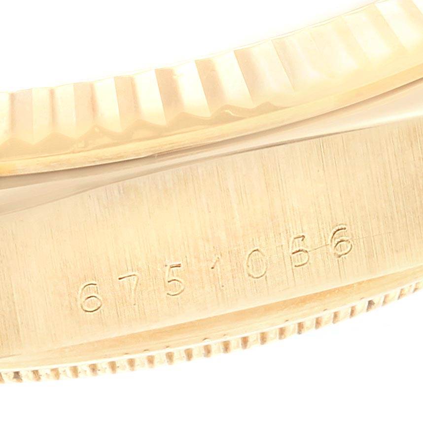 This image shows a close-up angle of the engraved serial number on the casing of a Rolex President 18038 Men
s Yellow Gold White Dial 18038 Men
s Yellow Gold White Dial model watch.