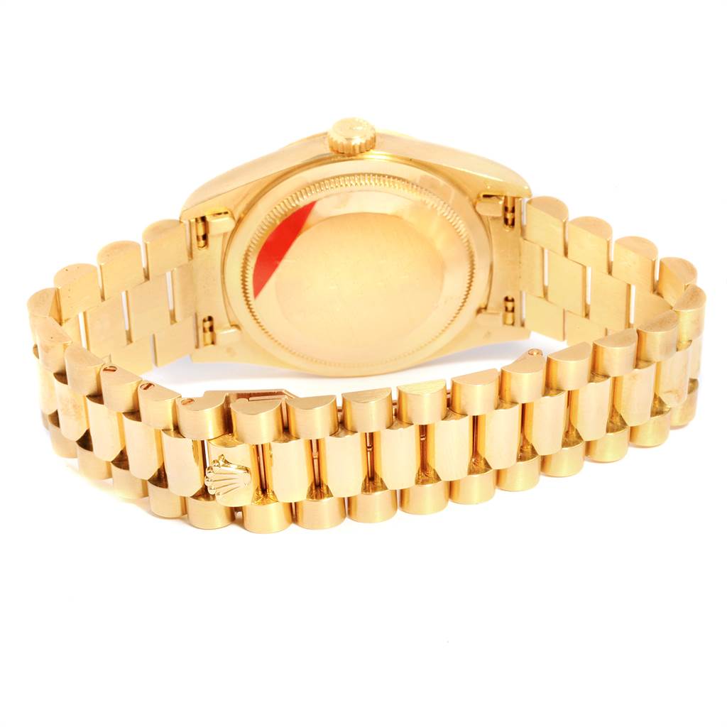 The image shows the back and bracelet of a Rolex President 18238 Men
s Yellow Gold Champagne Dial 18238 Men
s Yellow Gold Champagne Dial model watch in a gold tone.