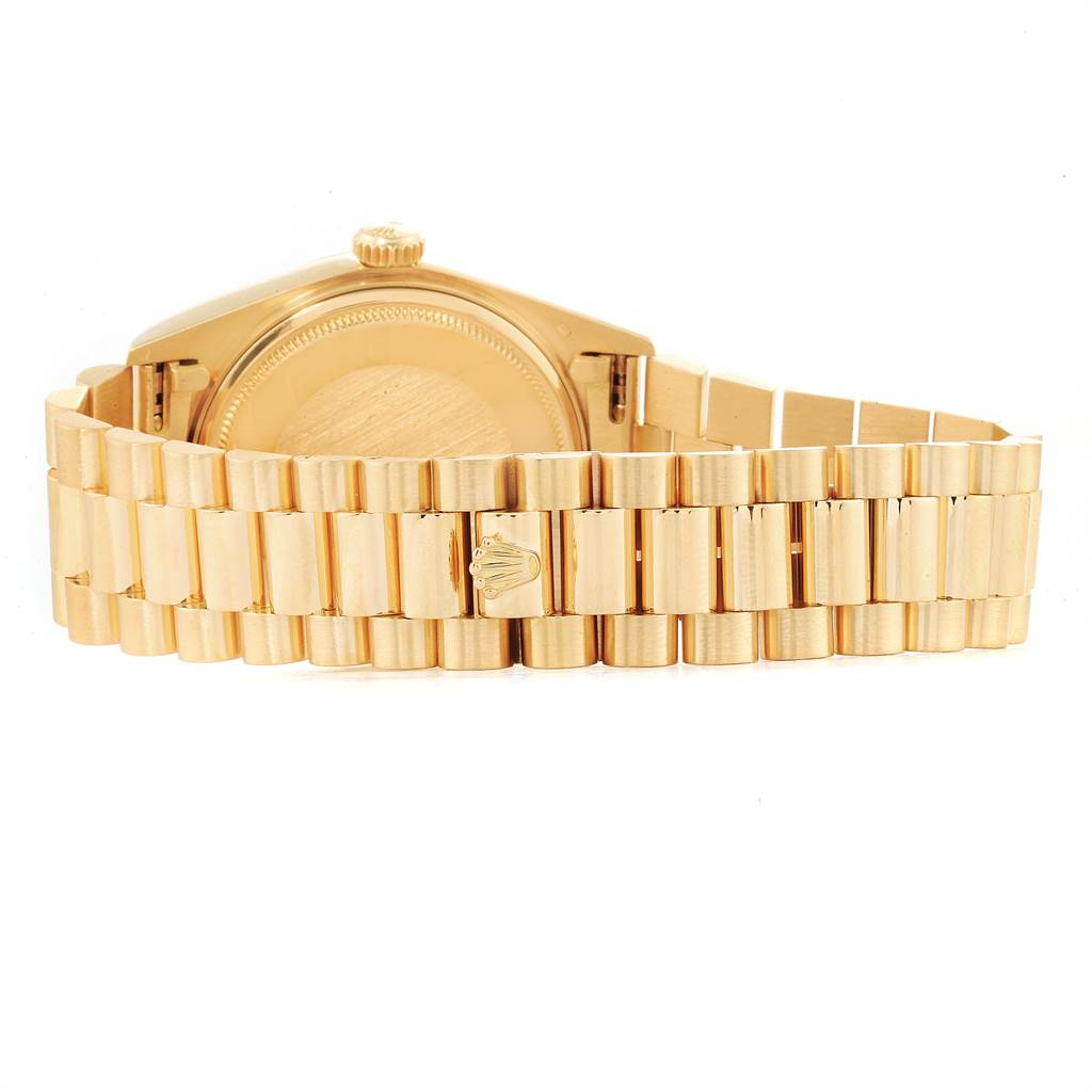 The image shows the back and bracelet of the Rolex President 18038 Men
s Yellow Gold Champagne Dial 18038 Men
s Yellow Gold Champagne Dial model watch in gold.
