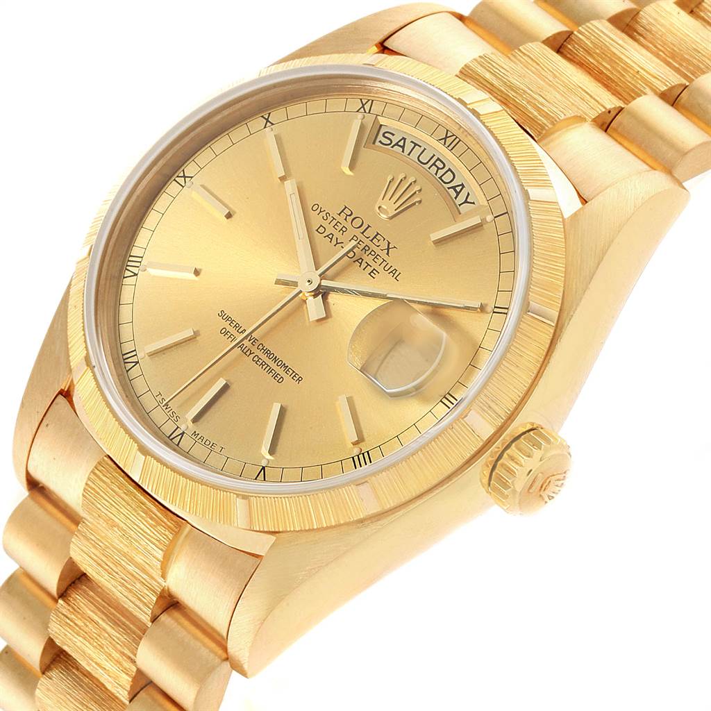 The image shows a close-up angle of the Rolex President 18078 Men
s Yellow Gold Champagne Dial 18078 Men
s Yellow Gold Champagne Dial model watch displaying the dial, bezel, crown, and part of the bracelet.