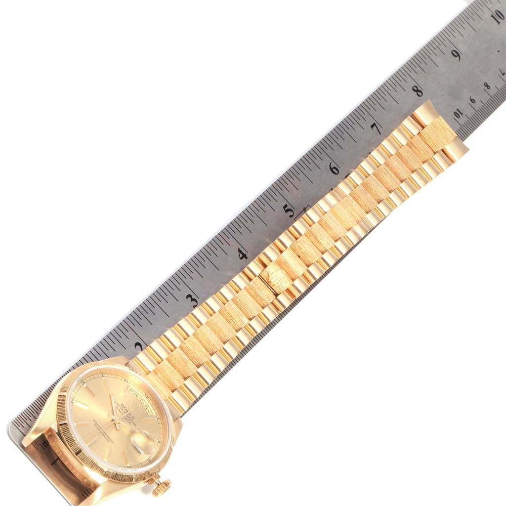 The image shows a Rolex President 18248 Men's Yellow Gold Champagne Dial 18248 Men's Yellow Gold Champagne Dial model watch flat, with the bracelet fully extended and aligned with a ruler for scale.